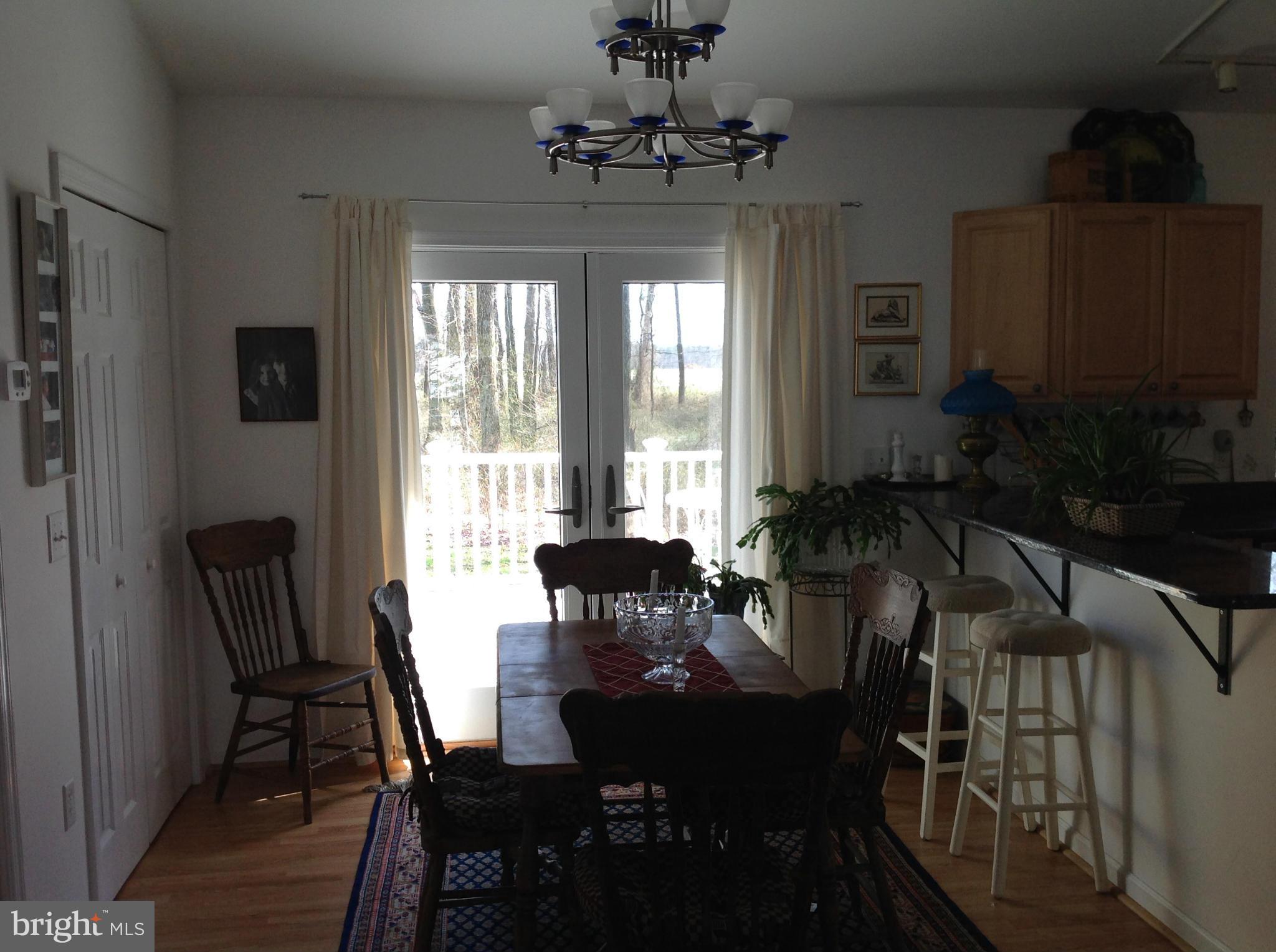 5754 Crosby Road Rock Hall, MD 21661 - Photo 8 of 26 Dining Room has glass doors to rear deck