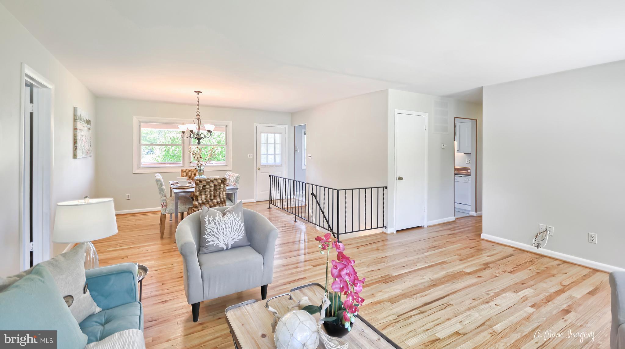 5190 Perry Road Mount Airy, MD 21771 - Photo 6 of 30 Refinished Hardwood Flooring in Family Room.