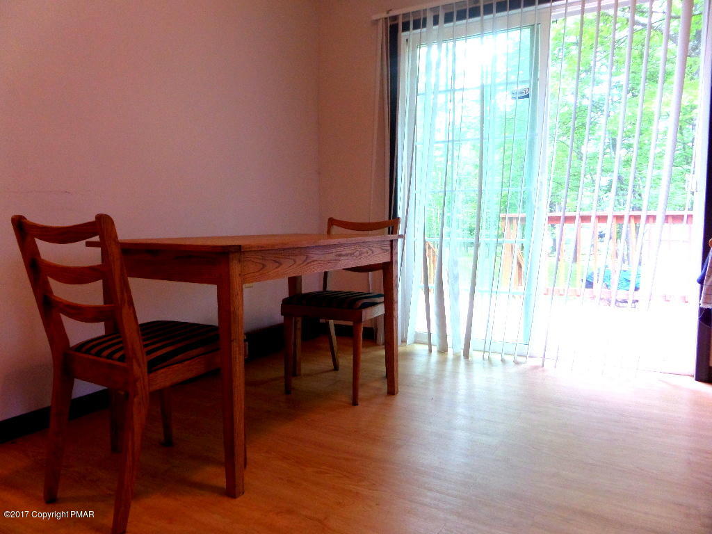 113 Lehman Road Bushkill, PA 18324 - Photo 14 of 23 a view of a dining room with furniture and wooden floor