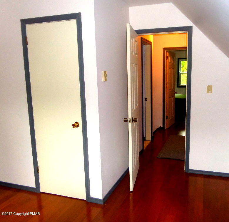 113 Lehman Road Bushkill, PA 18324 - Photo 22 of 23 a view of a hallway with wooden floor