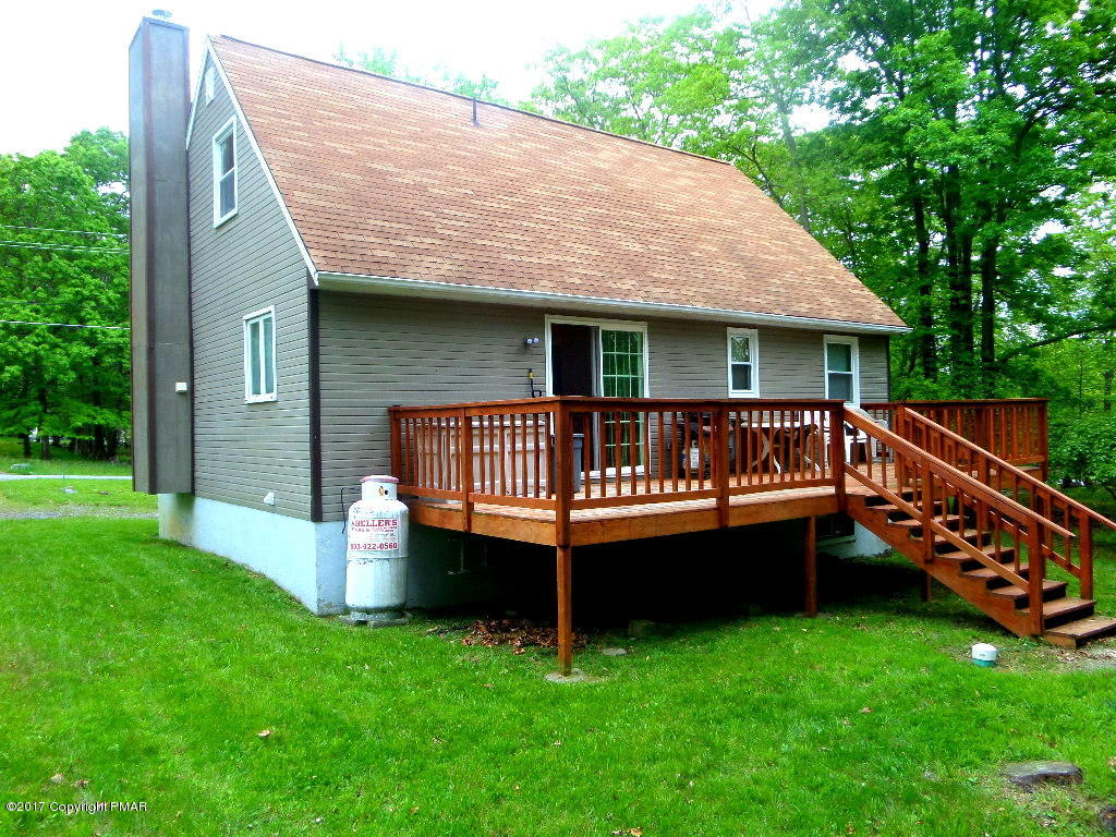 113 Lehman Road Bushkill, PA 18324 - Photo 5 of 23 a view of a house with a roof deck