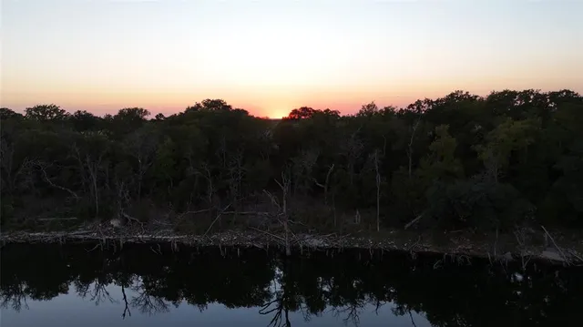 a view of lake with mountain