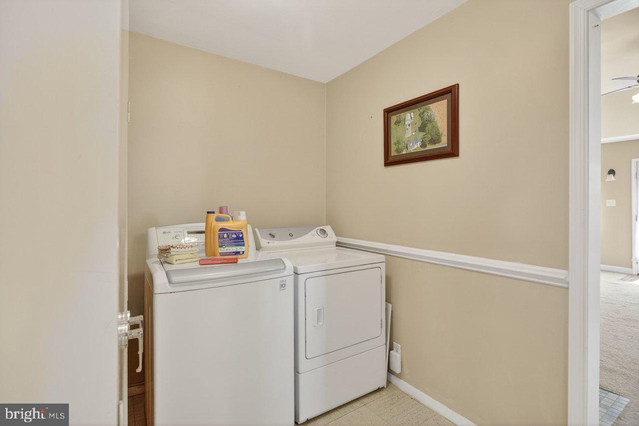 1751 Orchard Road Mount Jackson, VA 22842 - Photo 16 of 30 a utility room with dryer and washer