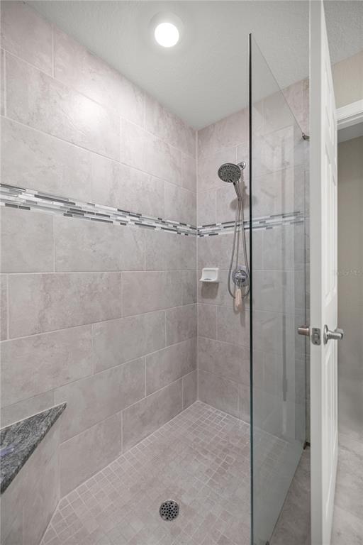 9609 Southwest 40th Terrace Ocala, FL 34476 - Photo 18 of 28 a bathroom with a shower