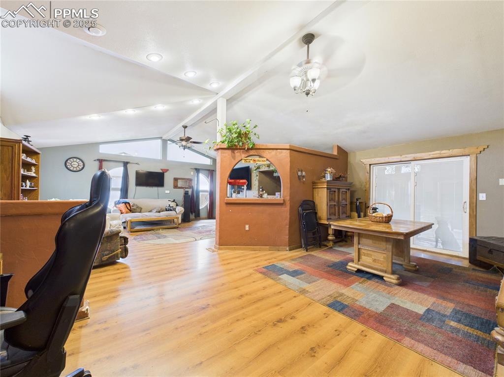 206 Lucille Street Avondale, CO 81022 - Photo 11 of 36 a living room with furniture and a table