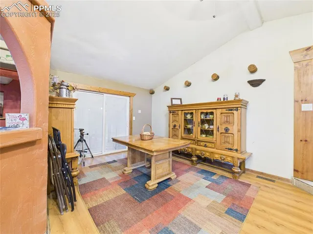 a living room with a table and a couch