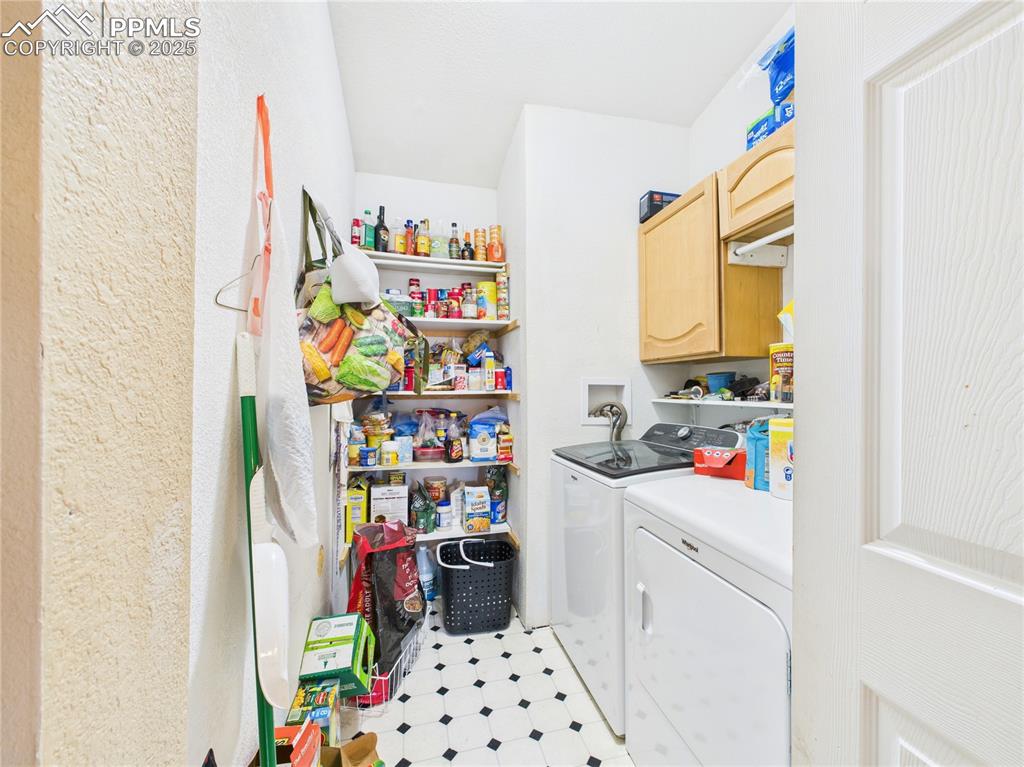 206 Lucille Street Avondale, CO 81022 - Photo 19 of 36 a room with storage and utility