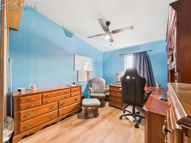 a room with furniture and gym equipment