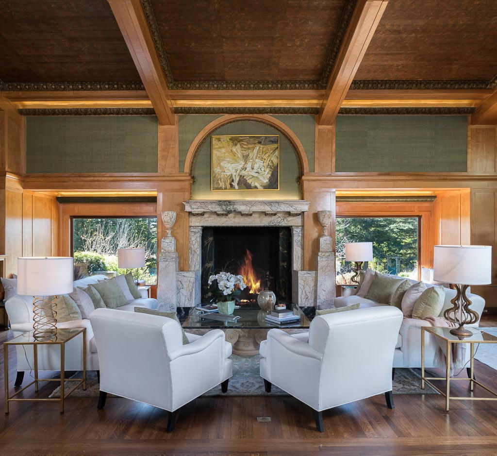 699 San Ysidro Road Montecito, CA 93108 - Photo 2 of 36 a living room with furniture a fireplace and a large window