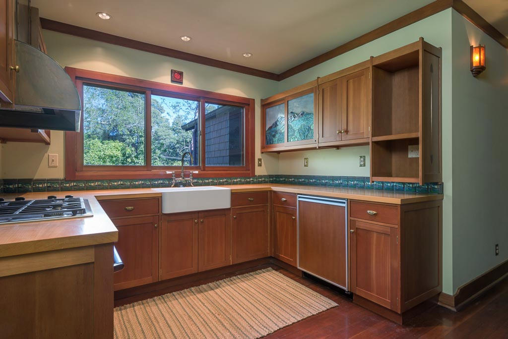 699 San Ysidro Road Montecito, CA 93108 - Photo 30 of 36 a kitchen with stainless steel appliances granite countertop a sink stove and refrigerator
