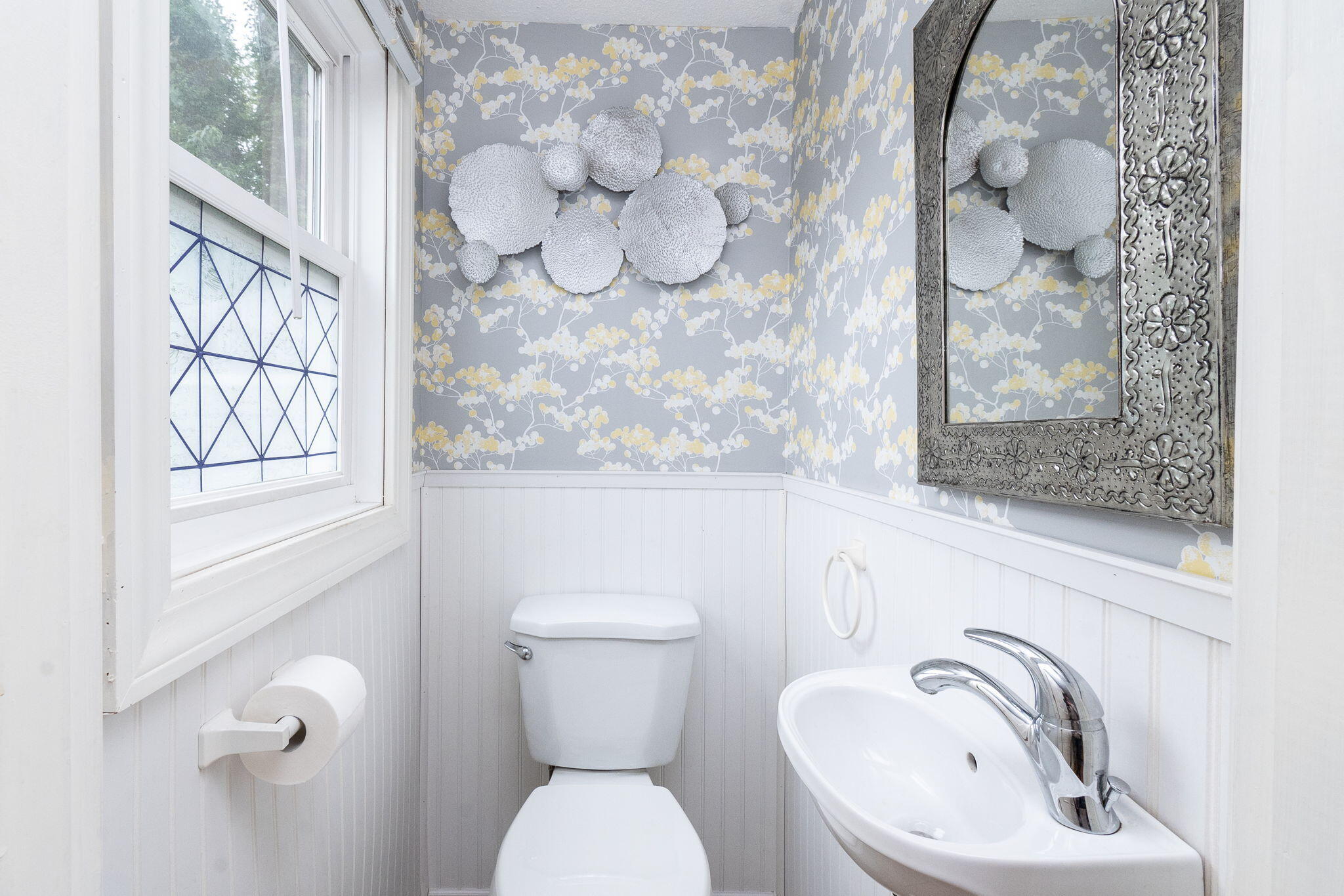 102 Sea Street Dennis Port, MA 02639 - Photo 13 of 40 a bathroom with a toilet sink and mirror