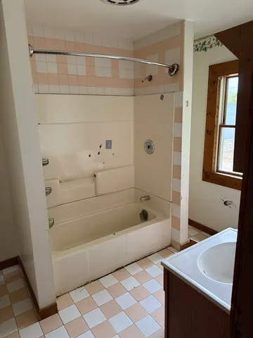 a bathroom with a bathtub