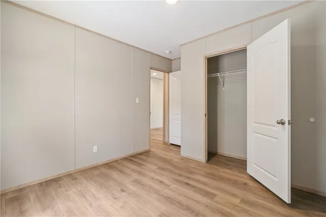 a bathroom with a bathtub shower sink vanity and toilet