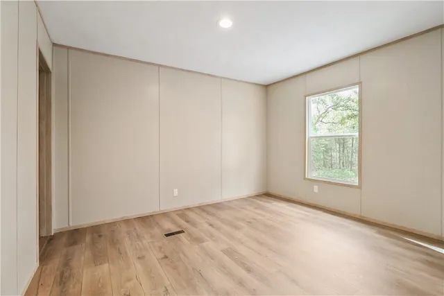 a view of an empty room and window