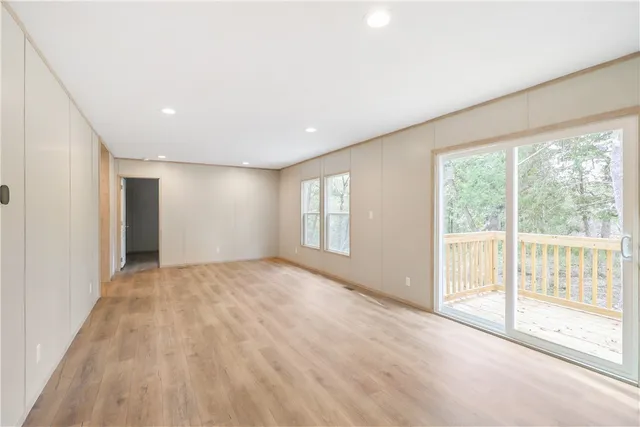 a kitchen with stainless steel appliances granite countertop a refrigerator sink and cabinets