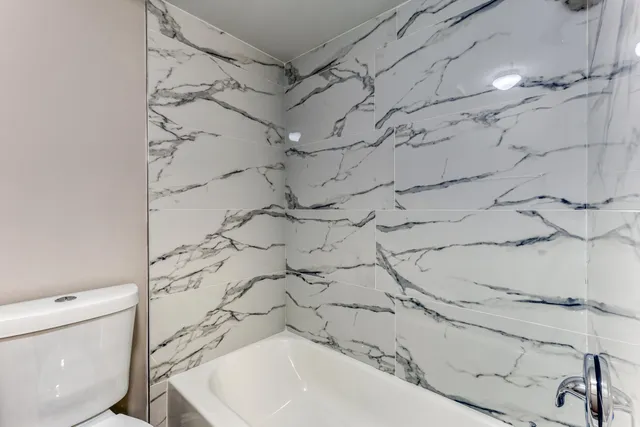 a bathroom with a sink and a toilet