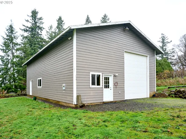 a view of a backyard with a garden