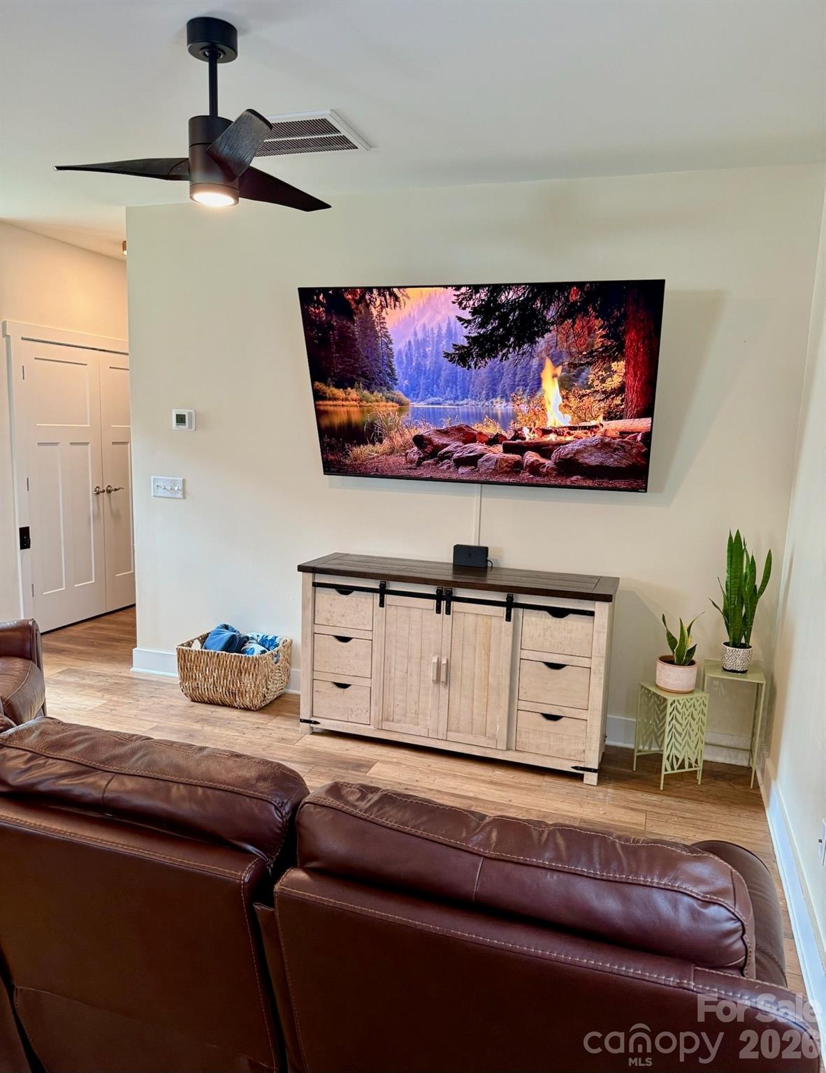 526 Cardwell Lane Fletcher, NC 28732 - Photo 11 of 37 a living room with furniture and a flat screen tv