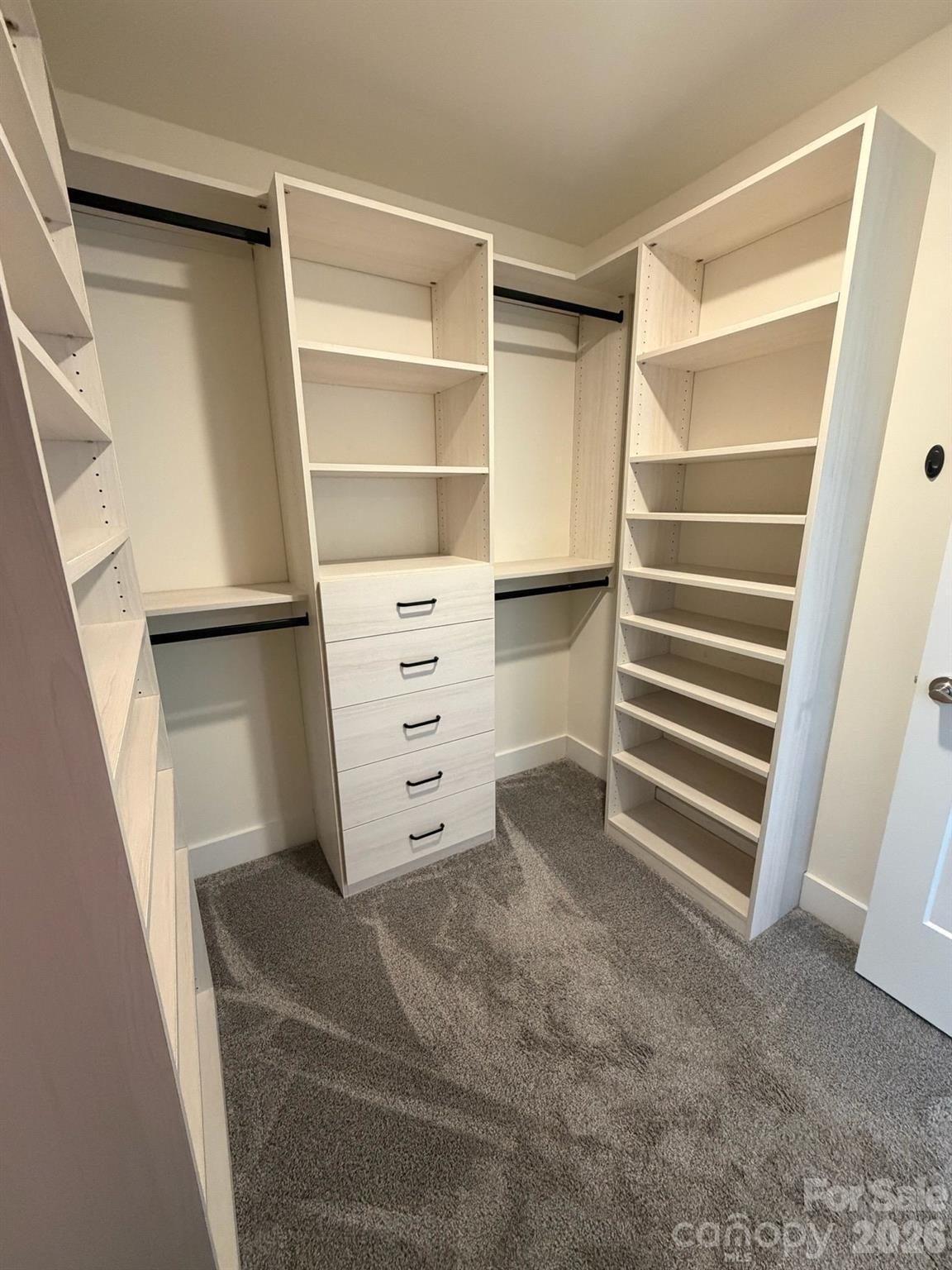 526 Cardwell Lane Fletcher, NC 28732 - Photo 27 of 37 a view of walk in closet with empty racks