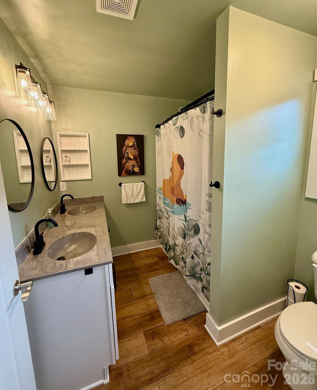 526 Cardwell Lane Fletcher, NC 28732 - Photo 30 of 37 a bathroom with a sink toilet and shower