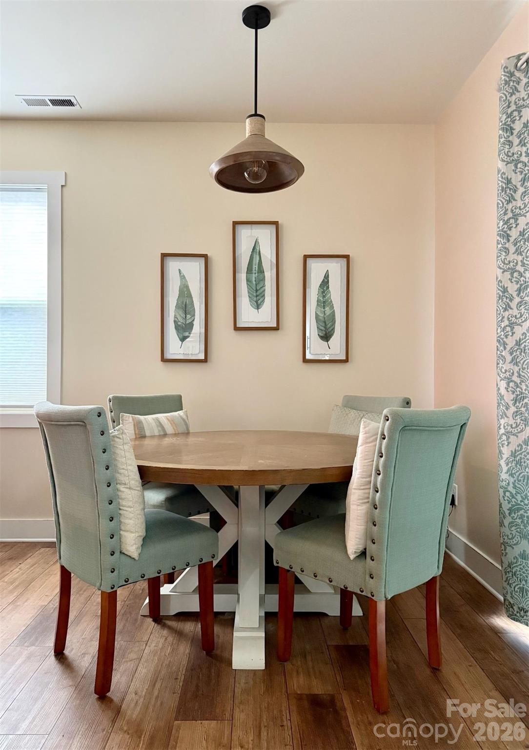 526 Cardwell Lane Fletcher, NC 28732 - Photo 9 of 37 a view of a dining room with furniture and wooden floor