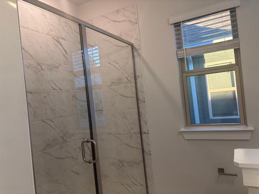 825 West Mayfield Road, Unit 224 Arlington, TX 76015 - Photo 13 of 25 a bathroom with a shower