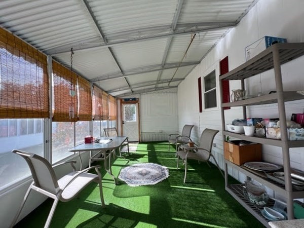 10 St James Circle Hudson, MA 01749 - Photo 11 of 14 a patio with yard table and chairs