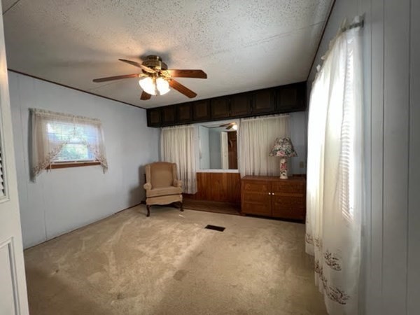 10 St James Circle Hudson, MA 01749 - Photo 9 of 14 a living room with furniture and a window