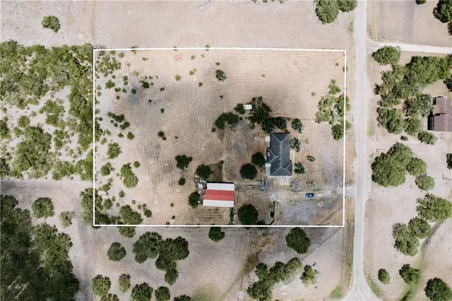 a view of house with yard