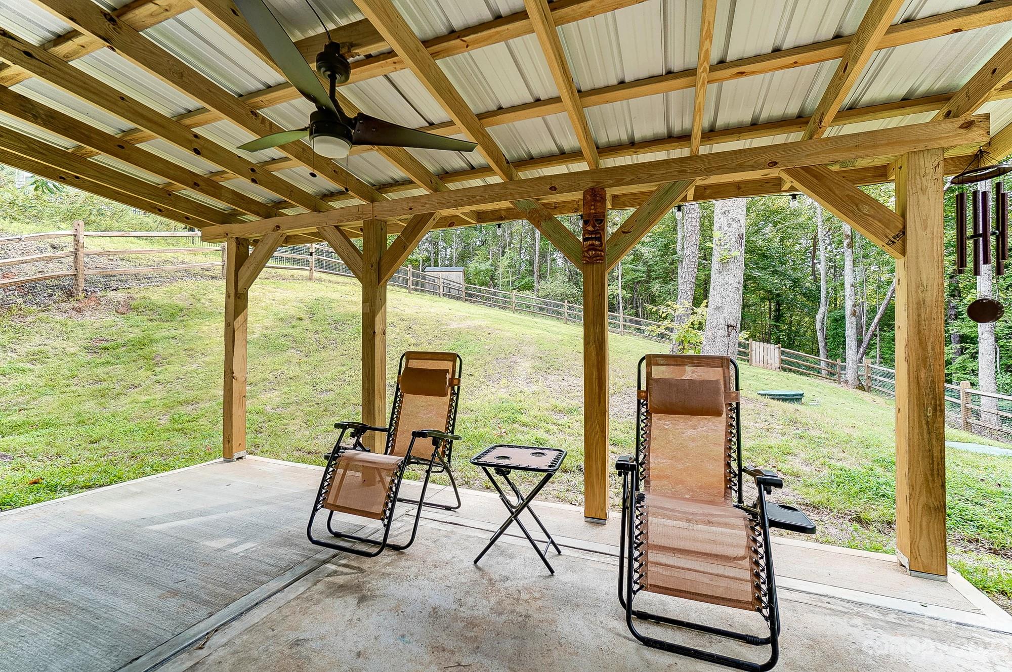 164 Mill Creek Road Iron Station, NC 28080 - Photo 43 of 48 a view of porch with seating space