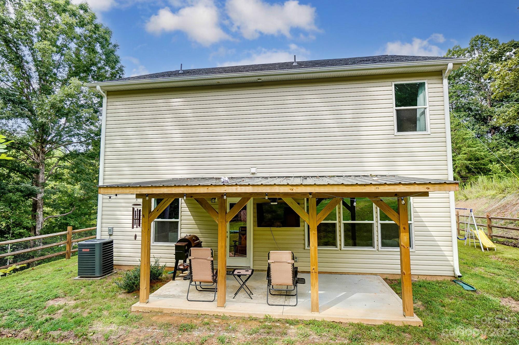 164 Mill Creek Road Iron Station, NC 28080 - Photo 45 of 48 front view of a house with a yard