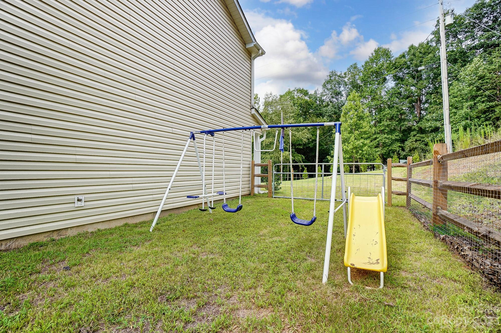 164 Mill Creek Road Iron Station, NC 28080 - Photo 47 of 48 a view of a house with a backyard