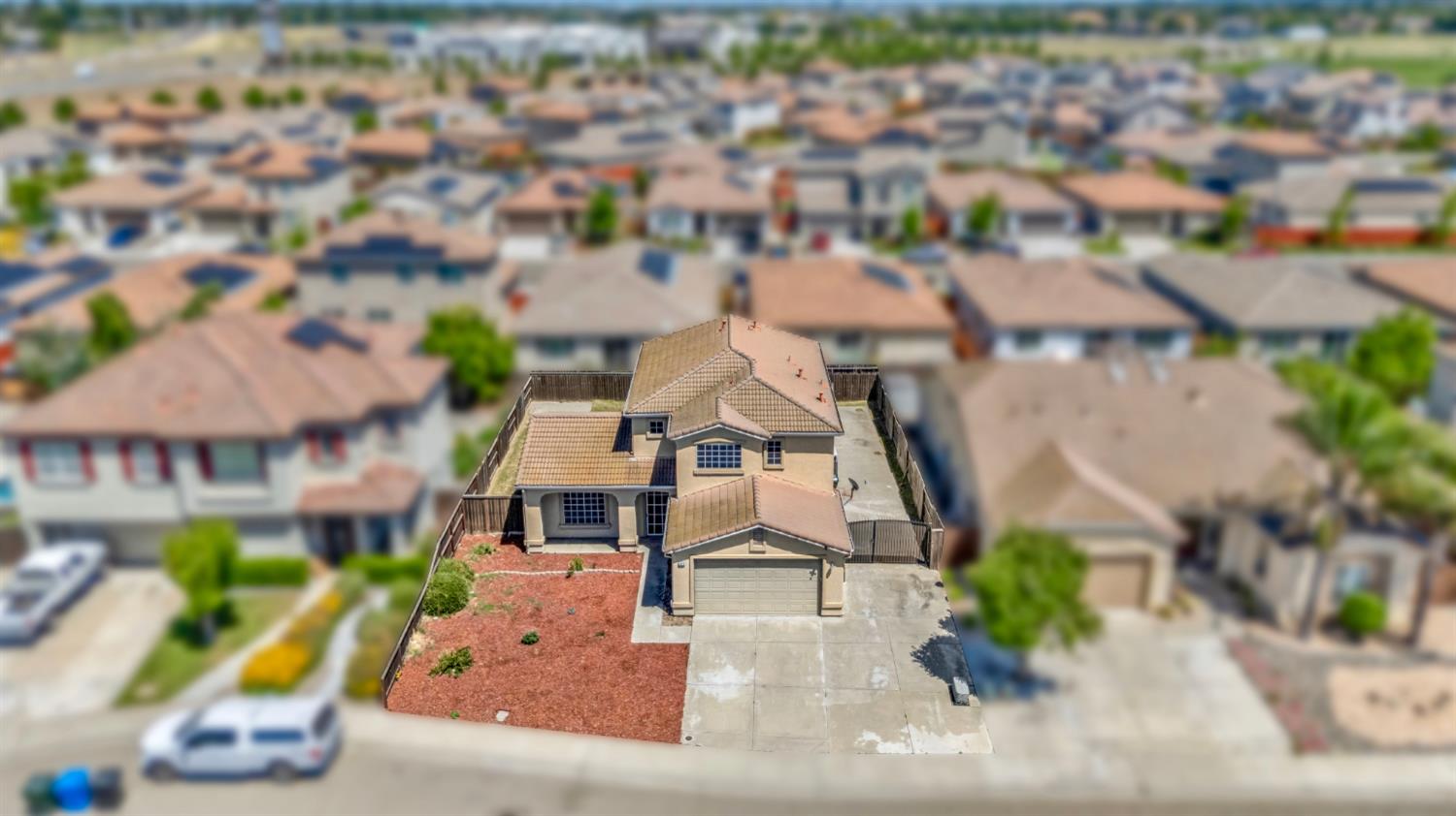 1412 Red Ribbons Lane Manteca, CA 95337 - Photo 32 of 32 an aerial view of multiple houses with a yard