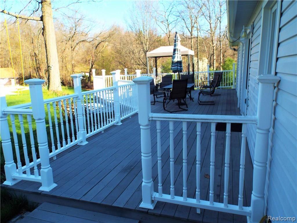 5375 Bullard Road Fenton, MI 48430 - Photo 20 of 43 Rear composite decking overlooking your back yard.