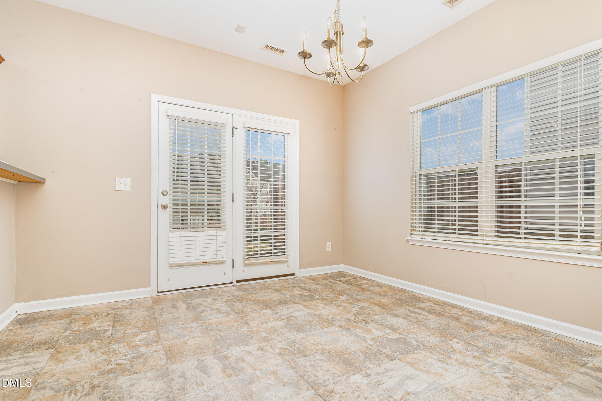 3531 Oneonta Avenue Raleigh, NC 27604 - Photo 10 of 32 a view of an empty room with a window