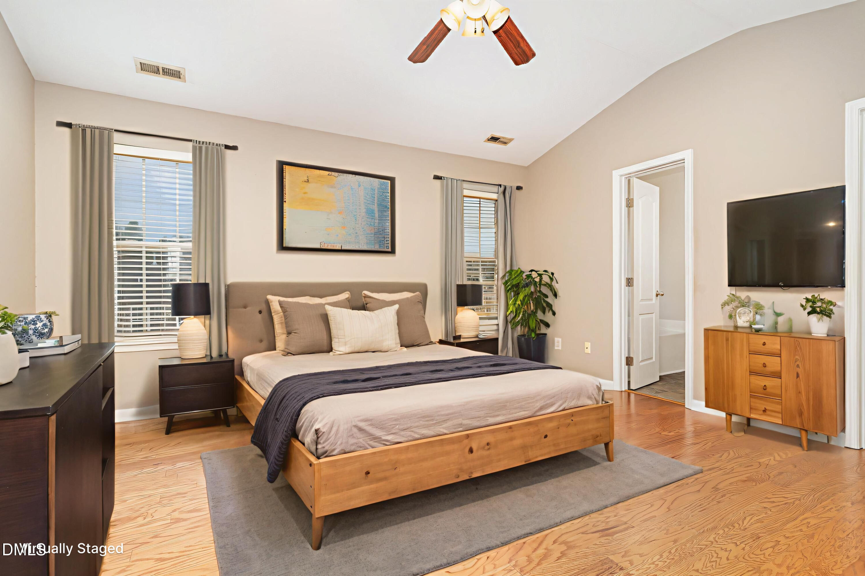 3531 Oneonta Avenue Raleigh, NC 27604 - Photo 17 of 32 a bedroom with a bed and a flat screen tv