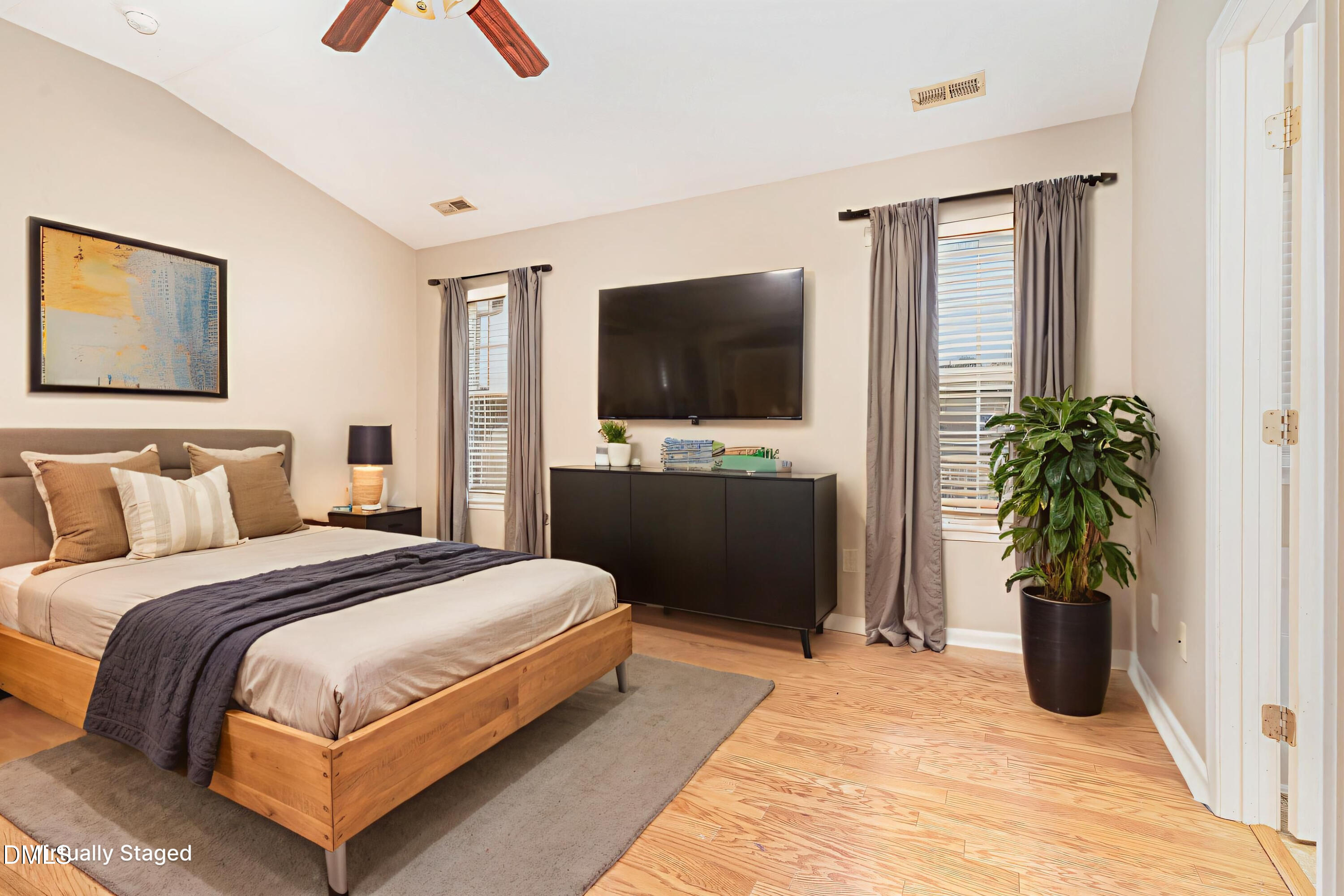 3531 Oneonta Avenue Raleigh, NC 27604 - Photo 19 of 32 a bedroom with a bed and a flat screen tv
