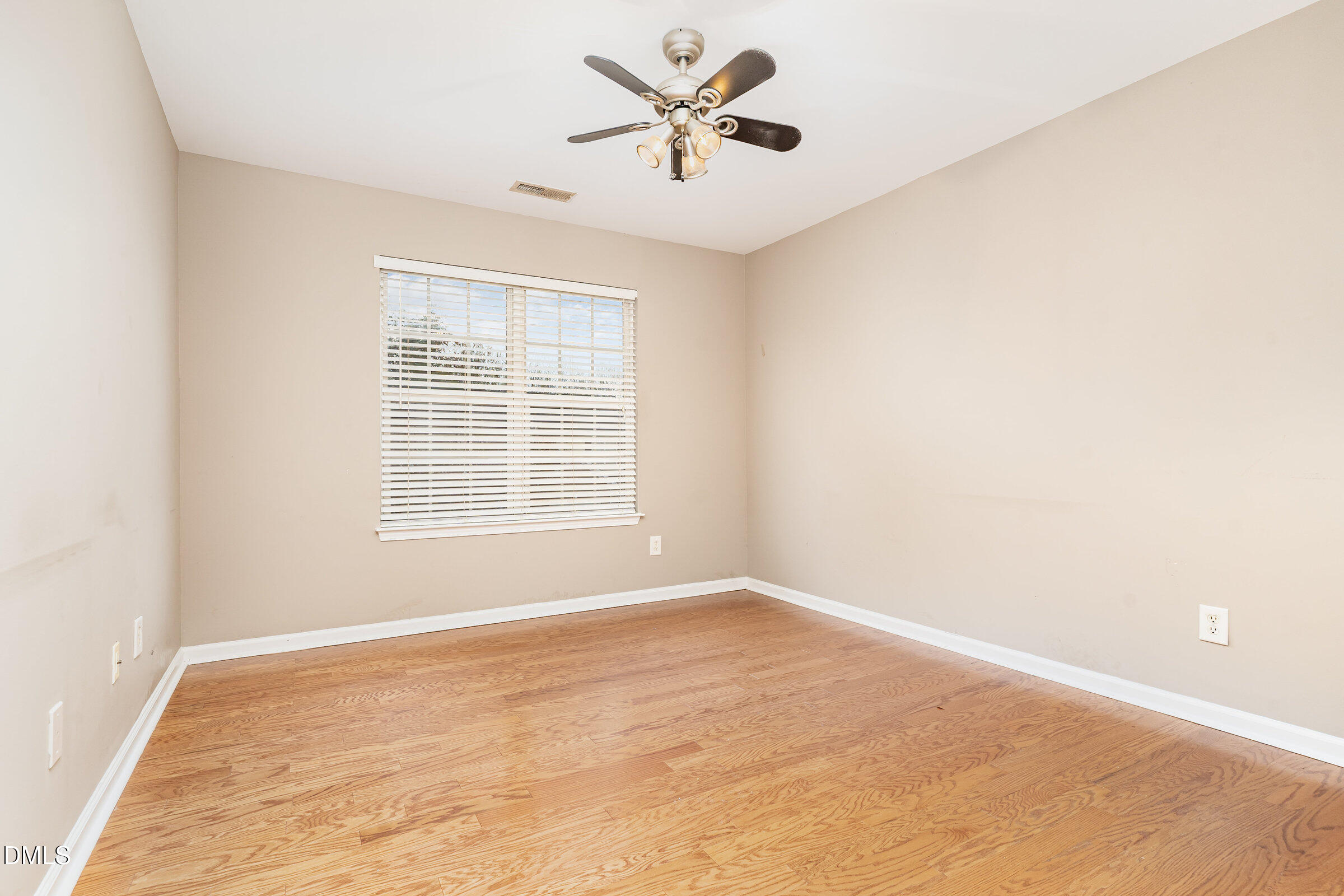 3531 Oneonta Avenue Raleigh, NC 27604 - Photo 24 of 32 a view of a room with a window and a ceiling fan