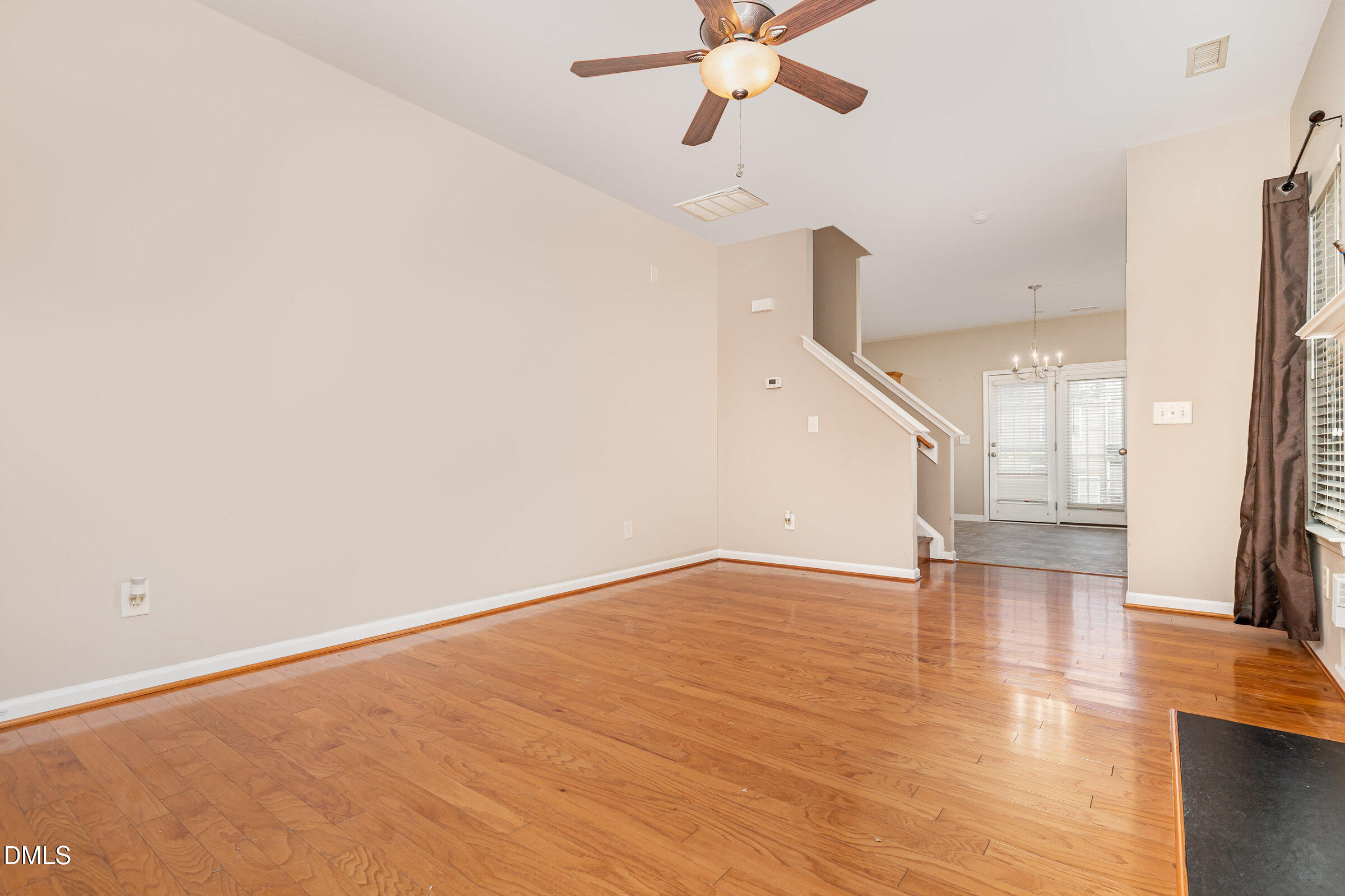 3531 Oneonta Avenue Raleigh, NC 27604 - Photo 8 of 32 a view of an empty room with wooden floor