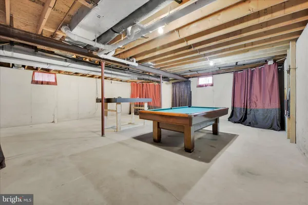 a room with stairs and a table
