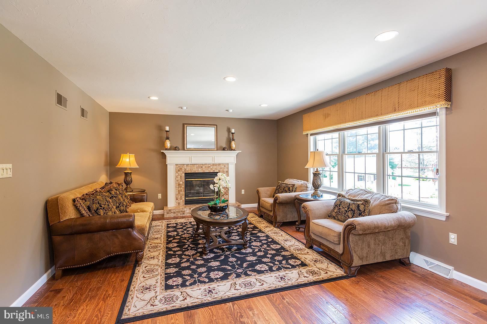 160 Olde Field Drive Lititz, PA 17543 - Photo 16 of 56 Family room with fireplace