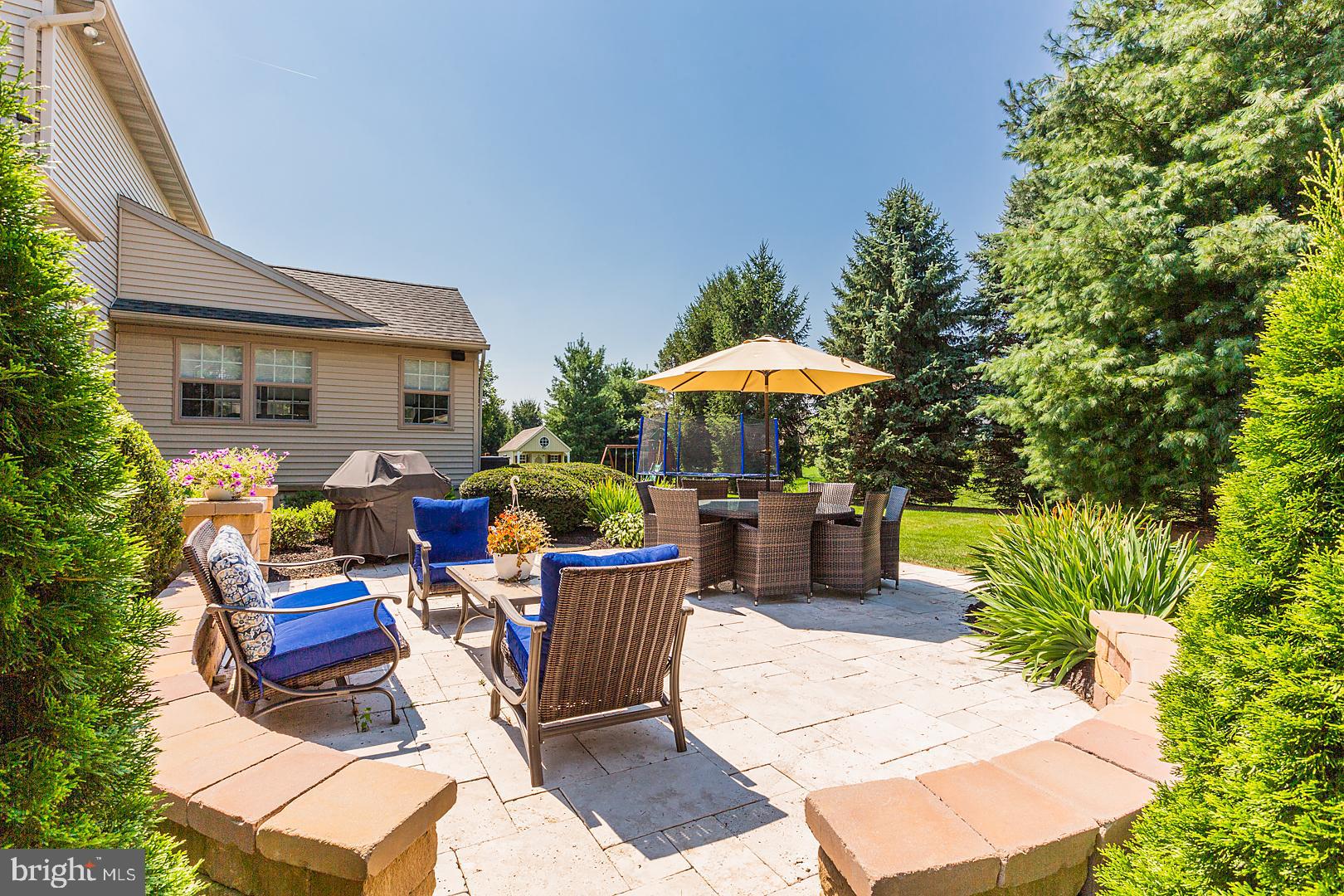 160 Olde Field Drive Lititz, PA 17543 - Photo 47 of 56 stamped concrete patio with stone wall