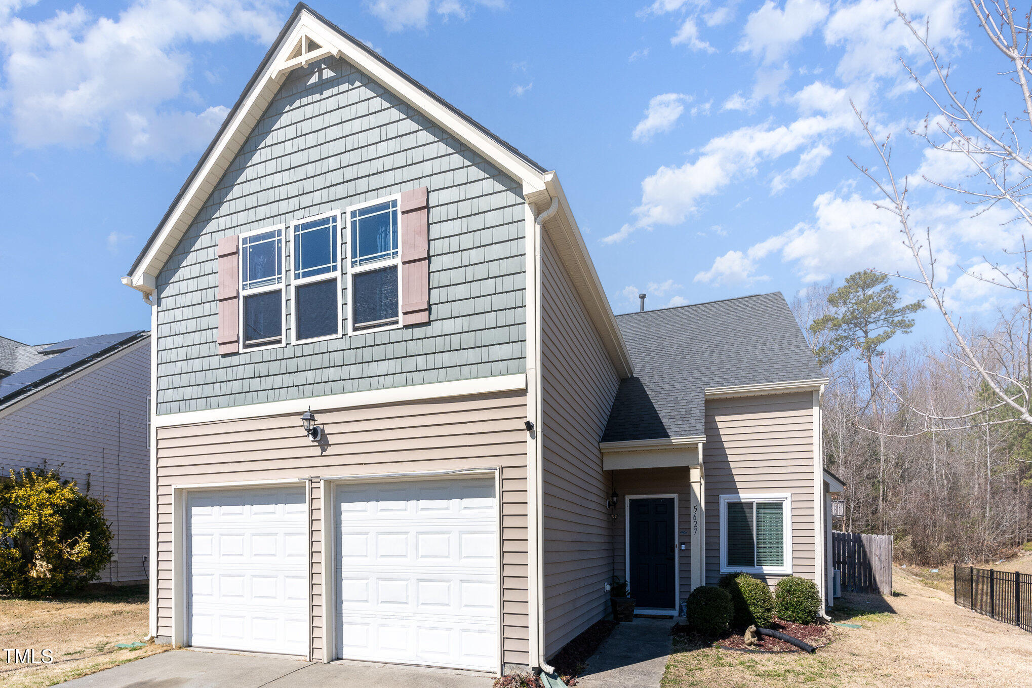 5627 Quitman Trail Raleigh, NC 27610 - Photo 2 of 26 a view of a house with a yard