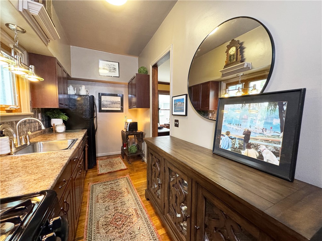 106 Argyle Street Rochester, NY 14607 - Photo 24 of 50 First floor unit’s galley kitchen has all amenities for convenience.