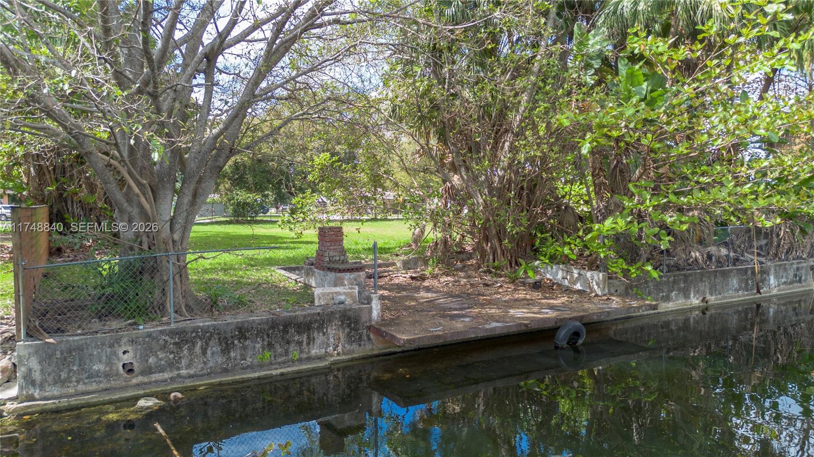 11701 West Biscayne Canal Road Miami, FL 33161 - Photo 13 of 14 a view of a trees in a yard
