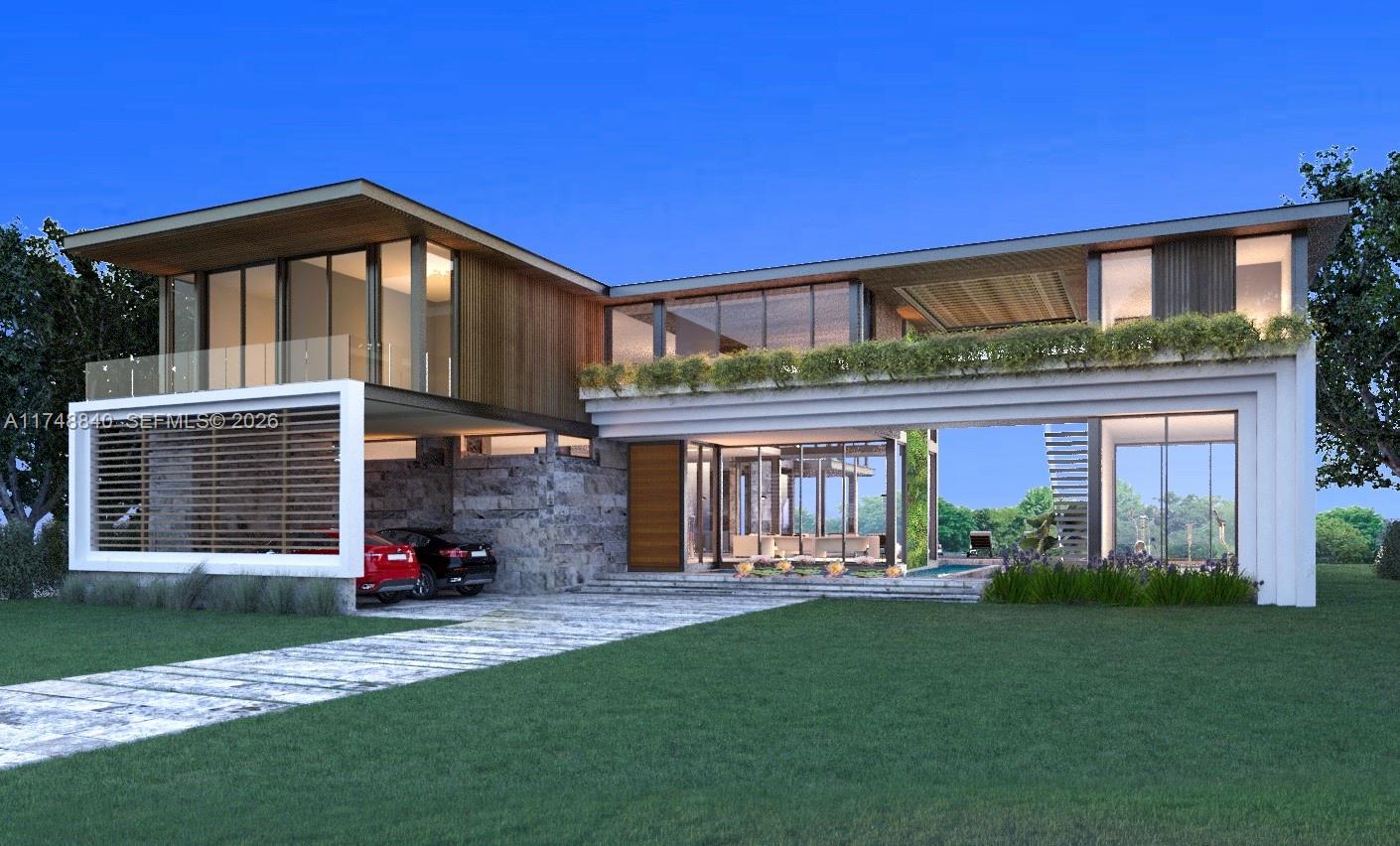 11701 West Biscayne Canal Road Miami, FL 33161 - Photo 4 of 14 a front view of a house with a yard table and garage