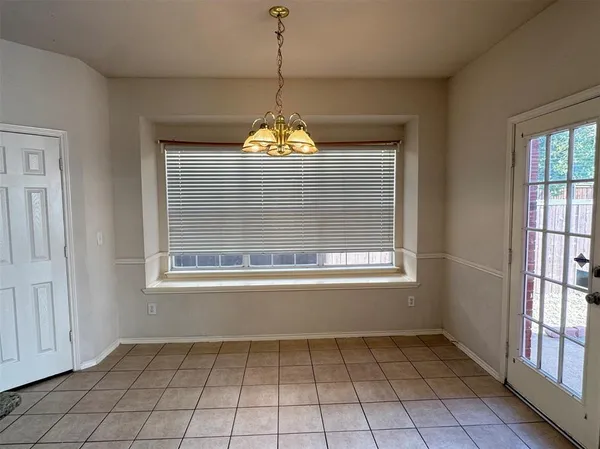 a view of an empty room with window