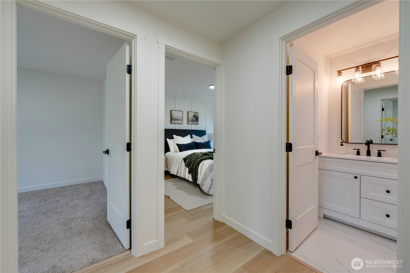 416 221st Street Southwest Bothell, WA 98021 - Photo 22 of 40 a en suite bathroom with a sink and a mirror