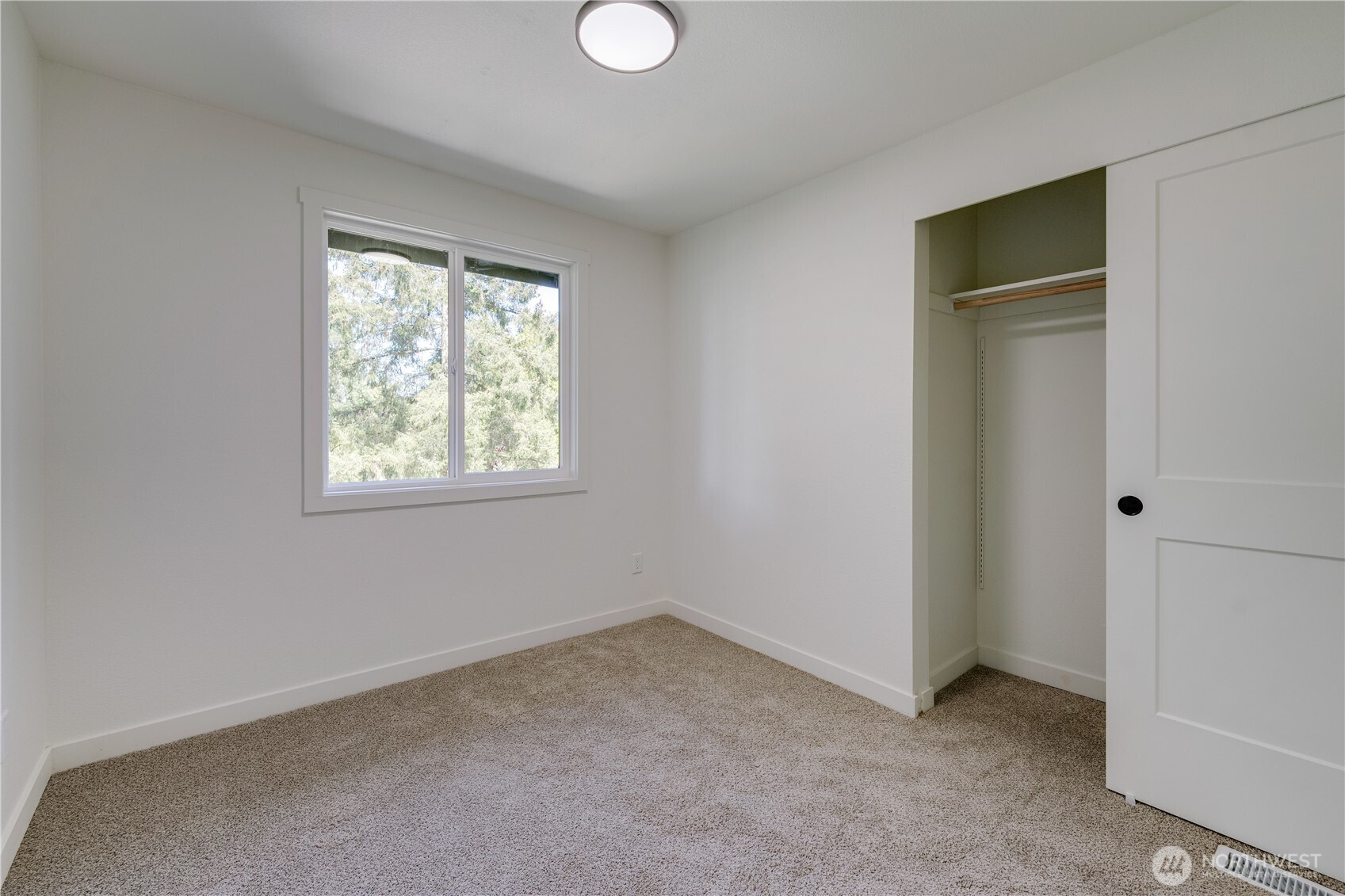 416 221st Street Southwest Bothell, WA 98021 - Photo 25 of 40 an empty room with windows