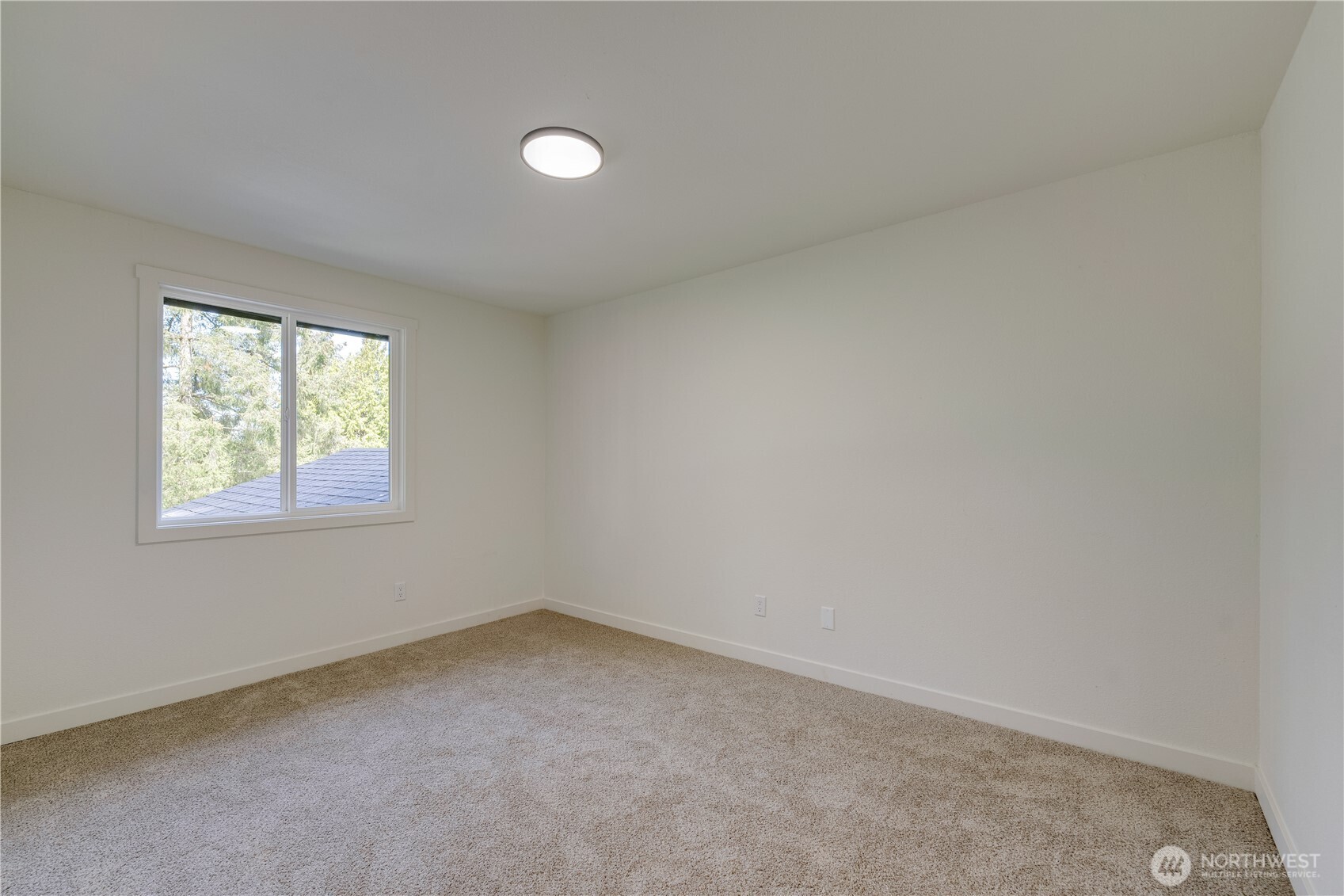 416 221st Street Southwest Bothell, WA 98021 - Photo 26 of 40 an empty room with a window